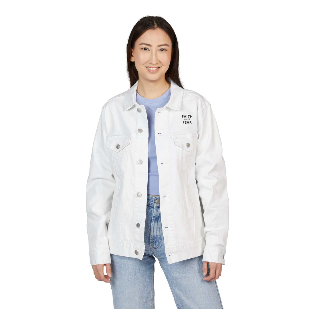 Woman wearing white Faith Over Fear denim jacket with chest pockets and button closure