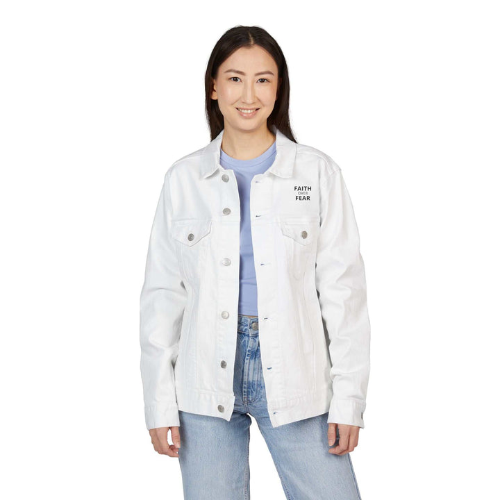 Woman wearing white Faith Over Fear denim jacket with chest pockets and button closure
