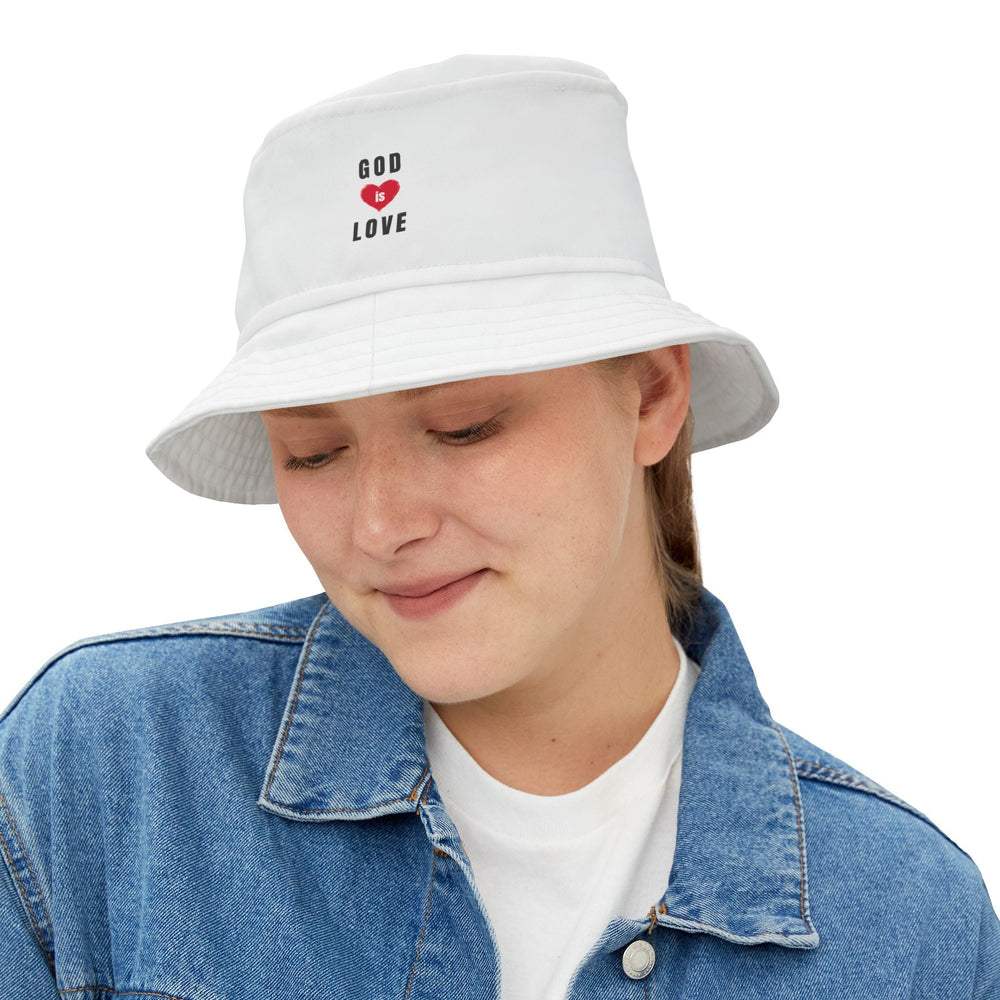 Woman wearing a white God Is Love Bucket Hat