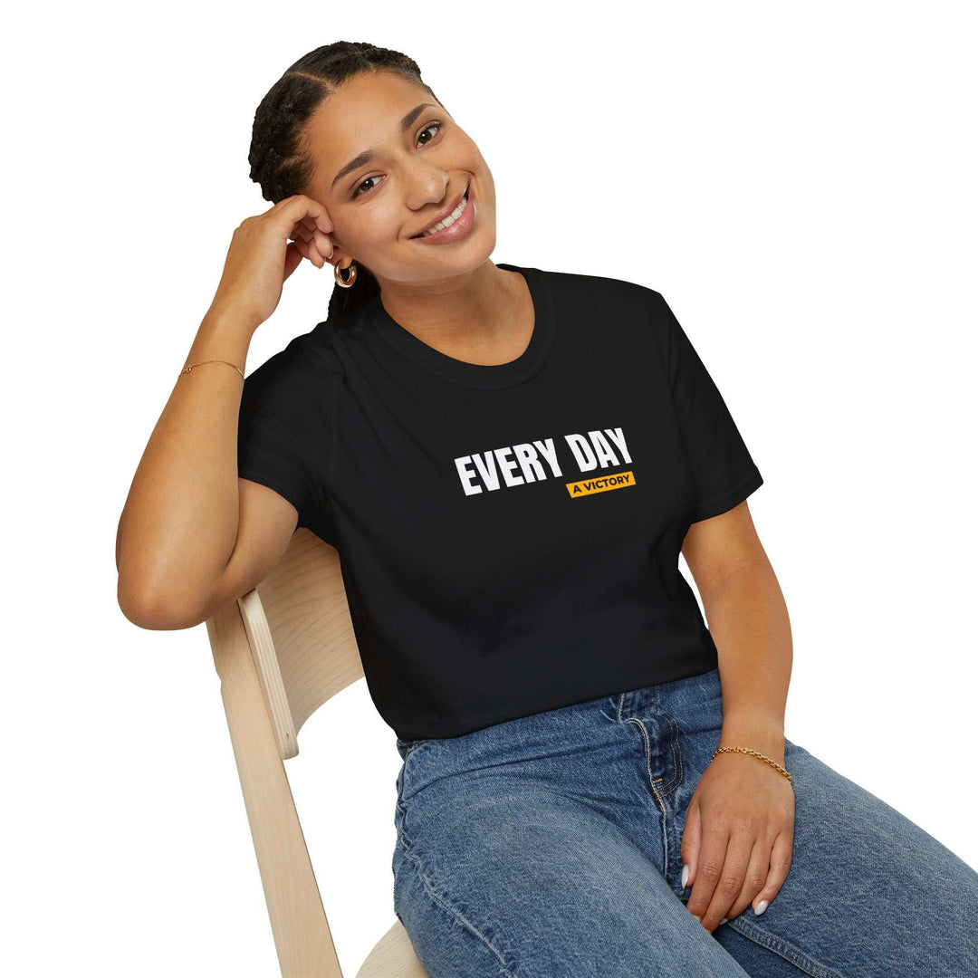 Woman wearing black T-Shirt with "Every Day a Victory" text