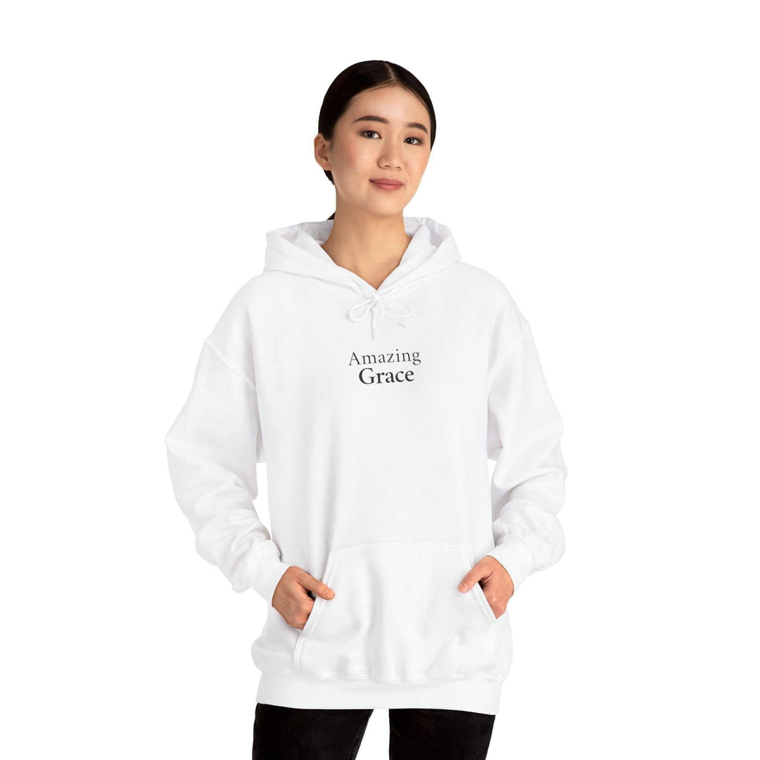 white hoodie with "Amazing Grace" text worn by woman, classic fit, soft cotton-polyester blend