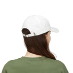 Woman wearing white God Bless America Cap