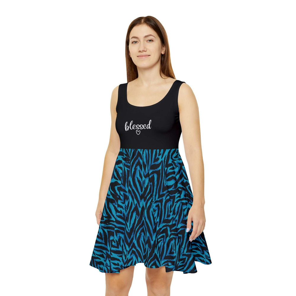 woman wearing Blessed Skater Dress with black top and blue patterned