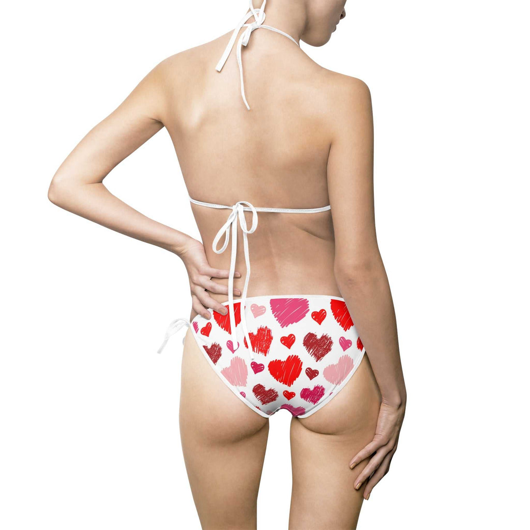 woman wearing Love Bikini Swimsuit with red and pink heart patterns