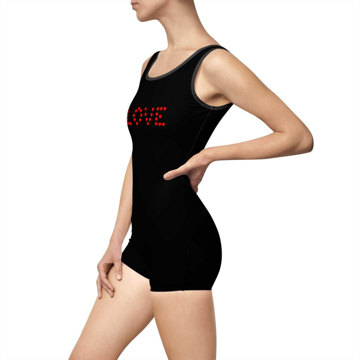 woman wearing black Love Swimsuit with red heart design