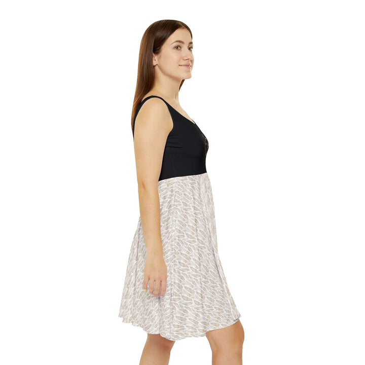 woman wearing black and white Hearts Skater Dress side view