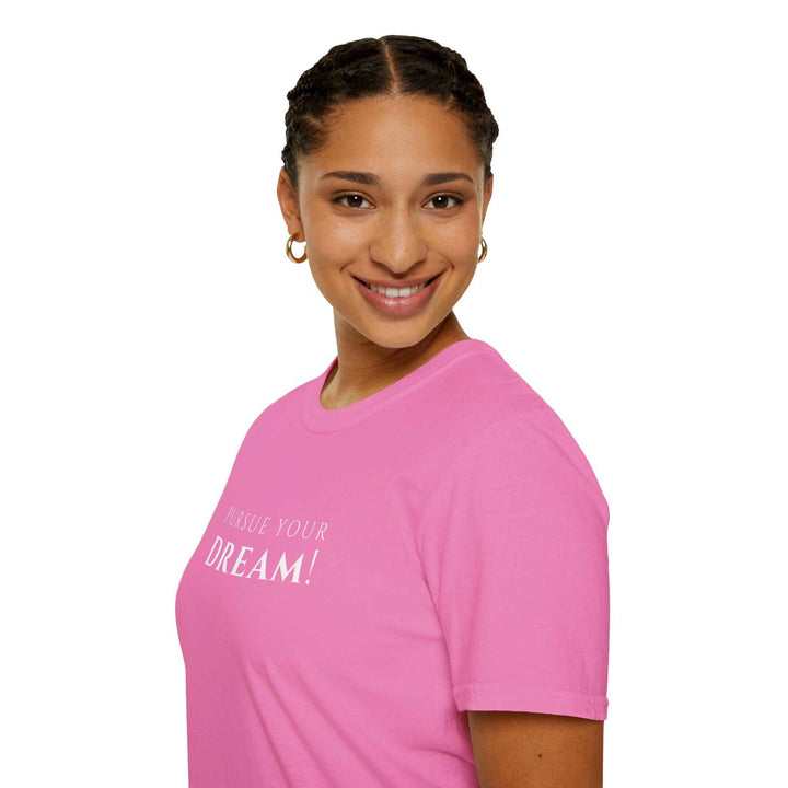 woman wearing pink T-Shirt with white text "Pursue Your Dream"
